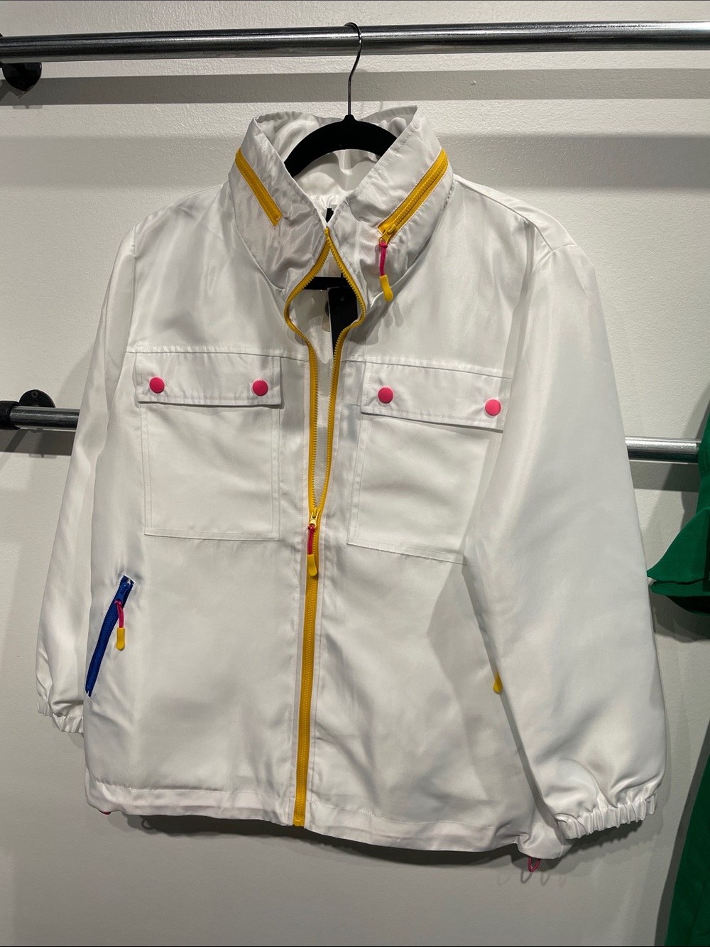 Oopera White Windbreaker Jacket with Yellow Zip and Pink Accents